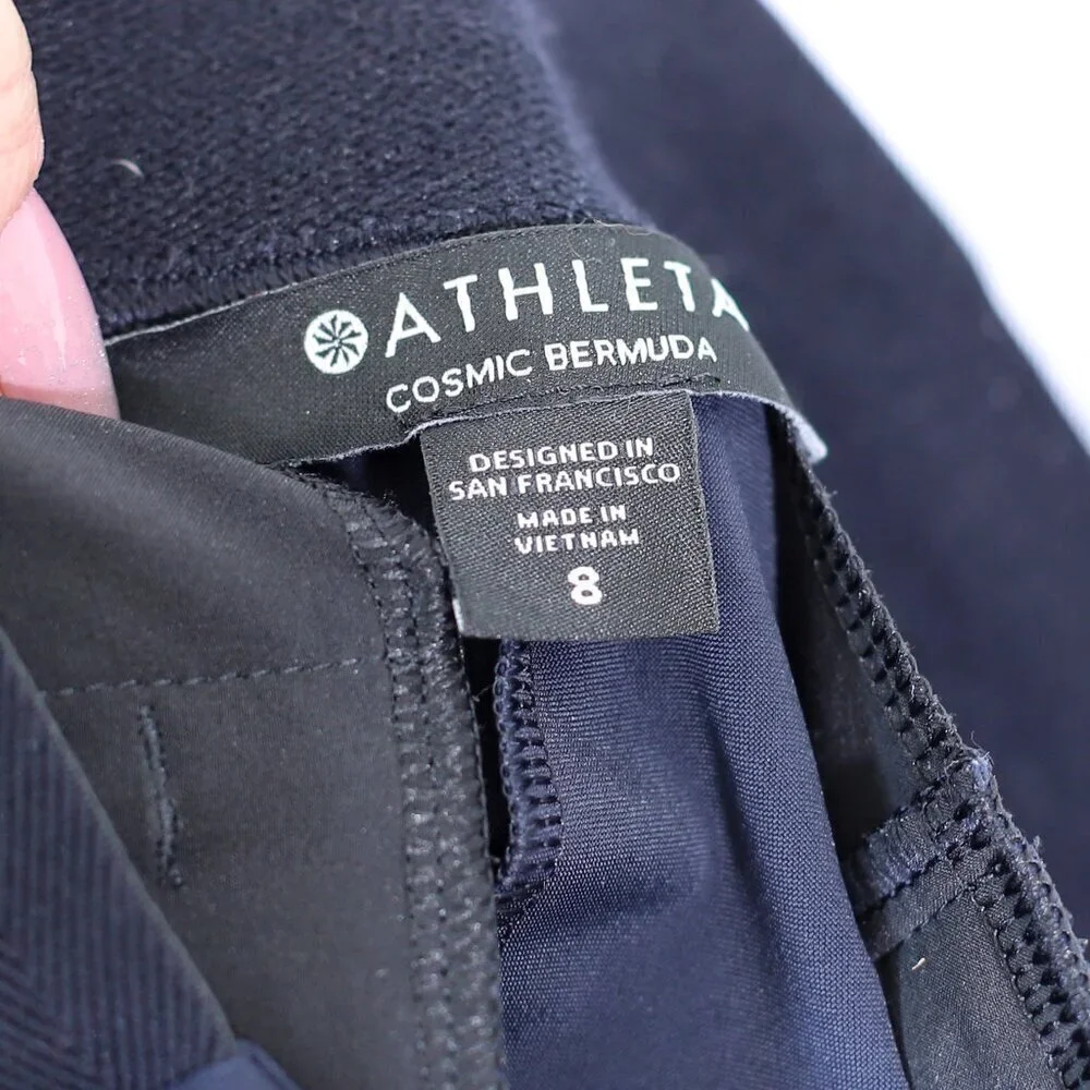 Athleta Size 8 dark blue Cosmic Bermuda stretch zip pockets shorts no size tag